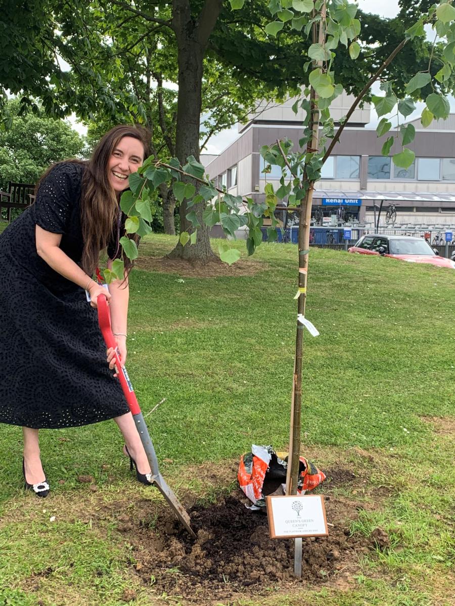 Hannah Coffey, deputy CEO plants at tree at Basildon Hospital